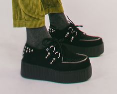 Hey there stud. Go for bold in these killer creepers featuring a black suede upper with stud and zipper detailing. Has a lightweight VIVA mondo creeper platform sole that measures approximately 1 ¾” at the heel and 1 ¼” in the front. Comes with removable memory foam padding for added comfort.