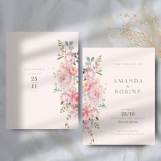 two wedding cards with pink flowers and greenery