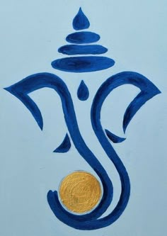 a painting with blue and gold colors on the side of a white wall that has an om shant symbol painted on it