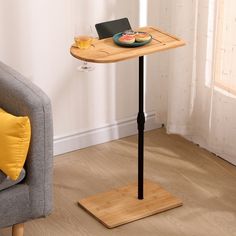 a small table with a laptop on it