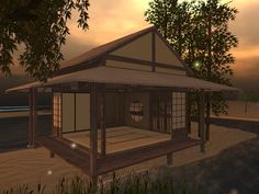 a gazebo sitting on top of a sandy beach next to the ocean at sunset