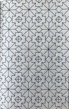 a black and white pattern is shown on a piece of paper