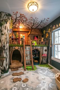 a child's bedroom with a tree house bed and slide