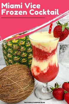 a frozen drink with strawberries and pineapples on the side next to it