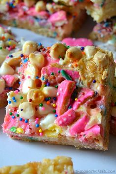 some kind of food with sprinkles and candy on it's side