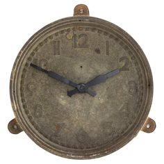 an old metal clock with roman numerals on the face and hands, isolated against a white background