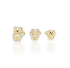 three small teddy bears with white and yellow diamonds on each earring, one in the shape