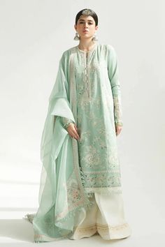 DESCRIPTION The Amira kurta wraps you in soothing tones of summer, creating the perfect backdrop for a summer breakfast with friends. It features an embroidered jaal on the shirt, a karandi net dupatta with beautiful corner motifs and printed pants. Dyed Karandi Net Dupatta 2.65 Yards Embroidered Lawn Dupatta Border 8.6 Yards Embroidered Lawn Dupatta Patches 4 Pcs Embroidered Lawn Front 1 Yard Dyed Lawn Back & Sleeves 1.6 Yards Embroidered Organza Shirt Border 1.6 Yards Embroidered Organza Sleev Zara Shahjahan Lawn, Breakfast With Friends, Dupatta Border, Zara Shahjahan, Organza Shirt, Summer Breakfast, Salwar Dress, Dress Salwar Kameez, Organza Sleeves