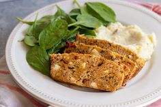 meatloaf, mashed potatoes and spinach on a plate