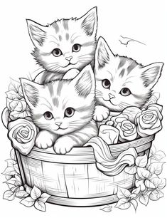 three kittens in a basket with roses