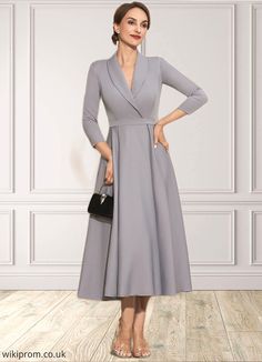 Jaelynn A-Line V-neck Tea-Length Stretch Crepe Mother of the Bride Dress SWK126P0014844 Silhouette:: A-Line Neckline:: V-neck Length:: Tea-Length Fabric:: StretchCrepe Straps:: Sleeves Sleeve:: 3/4Sleeves FullyLined:: Yes Built-InBra:: Yes Boning:: No Size:: General,Plus Season:: Spring,Fall,Winter This dress could be custom made, there are no extra cost to do custom size and color. Fitted V-neck Dress For Daywear, Chic Gray V-neck Maxi Dress, Elegant Fitted V-neck Dress For Daywear, Winter Evening Maxi Dress With V-neck, Formal V-neck Midi Dress, Fall Cocktail V-neck Maxi Dress, Elegant V-neck Midi Dress For Fall, Elegant V-neck Midi Dress For Daywear, Elegant Midi Dress With Notched Neckline For Fall