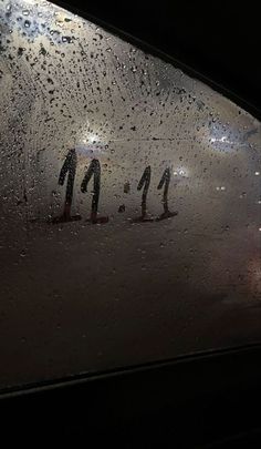 rain drops on the windshield of a vehicle