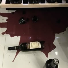 a bottle of wine sitting on top of a counter