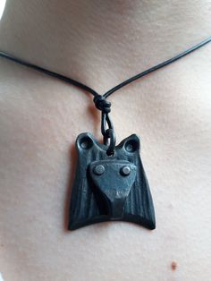 A hand forged bear pendant made from iron. Comes with a leather string. Finished with beeswax.  It's a real pleasure to work with animal themes, not only in sculptures but in these pieces of jewelry as well. Designed and handmade by Kimmo Tulimetsä. Animal Themes, Bear Pendant, Hand Forged Iron, Work With Animals, Forged Iron, Animal Theme, Hand Forged, Pendant Necklaces, Finland