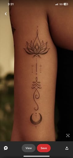 a woman's arm with a lotus tattoo on the left side of her body