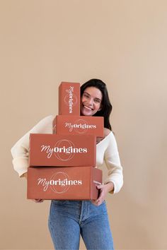 a woman is holding three boxes that say my sunshines, my morningies and my happiness