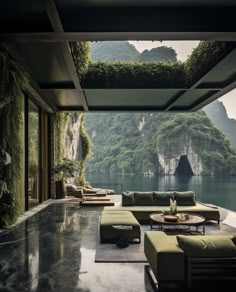 a living room filled with furniture next to a large window covered in greenery and mountains