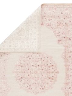 two rugs with pink and white designs on the bottom one has a beige border