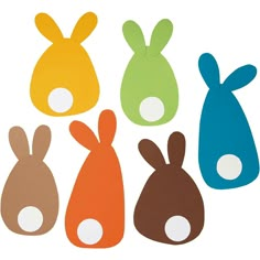 four different colored bunnies are in the shape of an animal's head and ears