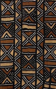 a brown and black area rug with different patterns