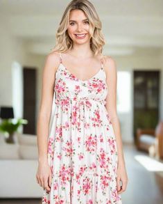 The Floral Frill Cami Dress is a delightful and feminine garment that features a floral print and frilled detailing for a charming and romantic look. This dress exudes a sense of whimsy and grace, making it perfect for warm weather occasions such as garden parties, brunches, or beach outings. The floral print adds a pop of color and a touch of nature-inspired beauty to the dress, while the frilled cami straps and hemline provide a flirty and playful element. With its relaxed and flowy silhouette, this dress is both comfortable to wear and effortlessly stylish. Whether you pair it with sandals for a casual day out or dress it up with heels for a more formal event, the Floral Frill Cami Dress is a versatile and lovely choice that will make you feel feminine and chic. Culture Code Features: P Culture Code, Garden Parties, Romantic Look, Printed Sleeves, Cami Dress, Womens Midi Dresses, Garden Party, Nature Inspired, Casual Dresses For Women