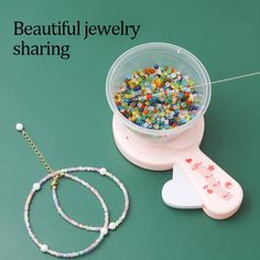 two bracelets and a necklace on a green surface with the words beautiful jewelry sharing