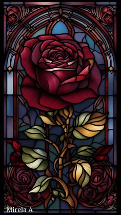 a stained glass window with a rose on it