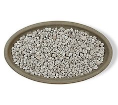 gravel in a bowl on a white background