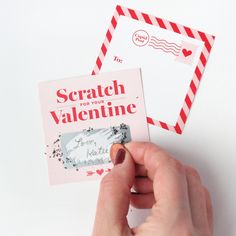 someone is holding up a valentine's card with the word scratch for your valentine on it