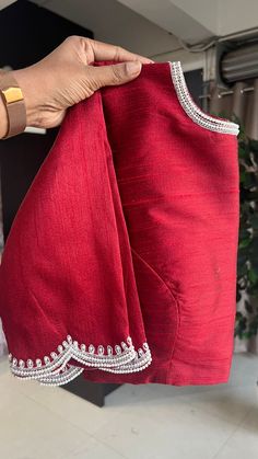 Product Descriptions : Deep maroon floral organza saree with scalloped pearl embroidery worked border is paired up with maroon silk pearl hand worked blouse having highlighted works on sleeves & neck. Blouse is provided with pearl hand made buttons as shown. View this post on Instagram A post shared by Shobana Nithin (@threadslabel_india) Hand Work Embroidery Blouse Neck Design, Saree Blouse Neck Designs Latest, Hand Embroidery Designs Blouse, Simple Handwork Blouse Design, Pearl Blouse Designs, Pearl Work Embroidery Blouses, Pearl Embroidery Blouse, Simple Embroidery Designs Blouse, Handwork Blouse Design