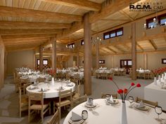 a large dining room with tables and chairs