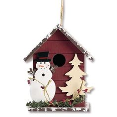 a birdhouse with a snowman and tree decoration