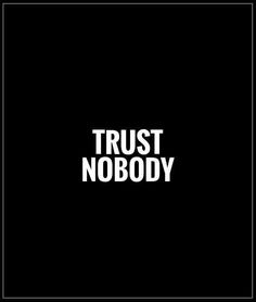 the words trust nobody are in white on a black background, and there is no image to describe