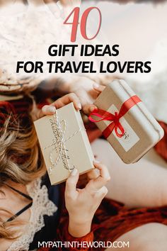 a woman holding a gift box with the words, 40 gift ideas for travel lovers