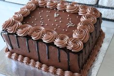 a chocolate cake sitting on top of a table