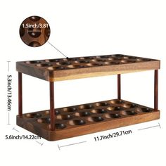 a wooden table with two tiered trays on it and measurements for each shelf