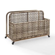 a wicker basket with wheels on an isolated white background