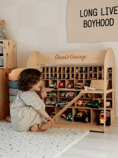 "If your kid loves cars, a large toy car storage from ChildUniverse will take a worthy place in your home toy collection. Handcrafted to last for generations, the wooden toy car parking garage has a compact size, so it's perfect for 1-4-year-olds. Excellent gift for boys who like vroom-vroom toys will make every other Birthday, Christmas, or Thanksgiving more festive The toy car storage garage has several floors. Purchase a garage to get: * Handcrafted piece of design that fits any interior of a playroom, nursery, bedroom, or living room; * A personalized toy to make it an exclusive gift to make the Christmas season more festive; * A fantastic game for group play (let kids socialize!); * A safe tool to boost kid's motor skills and help them cultivate their imagination; * An easy-to-assembl Cars Storage For Kids, My Garage Toy Cars, Diy Parking Garage For Kids Cars, Christmas Gifts For 3 Year Boy, Montessori Boys Room, Toy Vehicle Storage, Toy Car Organization, Gifts For One Year Old Boy, Gifts For 3 Year Boy