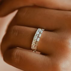 Made to Order Gold Kt: 14K (also available in 18K) Available Gold Color: Rose Gold, Yellow Gold, White Gold Round Diamond: 10 pcs 1.4 MM Baguette Diamond: 9 pcs 2.75 X 1.50 MM Number of Stones: 19 Total CTW: 0.40ct Diamond Color-Clarity: G Color VS Clarity Diamond Wedding Bands Stackable, Baguette Band, Round Diamonds Wedding Band, Stackable Diamond Rings, Diamond Stacks, Diamond Anniversary Rings