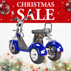 a blue scooter with christmas sale sign in the background