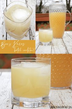 two glasses filled with liquid sitting on top of a wooden table next to a pitcher