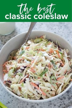 a white bowl filled with coleslaw and carrots