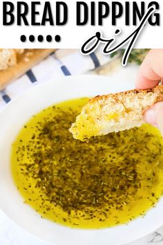 bread dipping with pesto in a white bowl