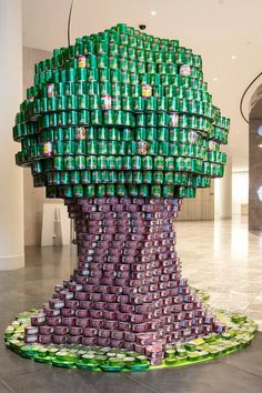 a large tree made out of beer cans