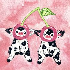 two black and white cows hanging upside down with cherries on their heads in front of a pink background