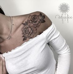 a woman with a flower tattoo on her shoulder