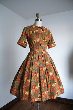 Super adorable cotton shirtwaist dress from the late 1950s. This dress features a random fun print of apples and roosters!! Label: Connie Sag???  Measurements: { small } Bust: 36"  Waist: 26"  Hips: open Length: 39" Sleeve Length: 12.5" unrolled Condition: excellent vintage condition with minor signs of wear - sold as found. washed and ready to wear - maybe a hint of discoloration in a couple of the novelties as shown. ☆Shop☆ http://www.trunkofdresses.com/ 1950s Shirtwaist Dress, 1950 Style, 1960s Dresses, 1950 Fashion, Fashion 1950s, Shirtwaist Dress, 1950s Style, 20 Off Sale, 50s Dresses