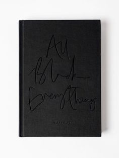 a black book with writing on it that says, all is bright and everything else