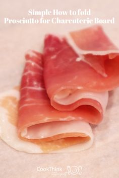 two pieces of ham sitting on top of a white plate with the words simple how to fold prosciutto for charlotte board