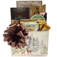 a christmas gift basket with chocolates, cookies and other treats in it's wrapper